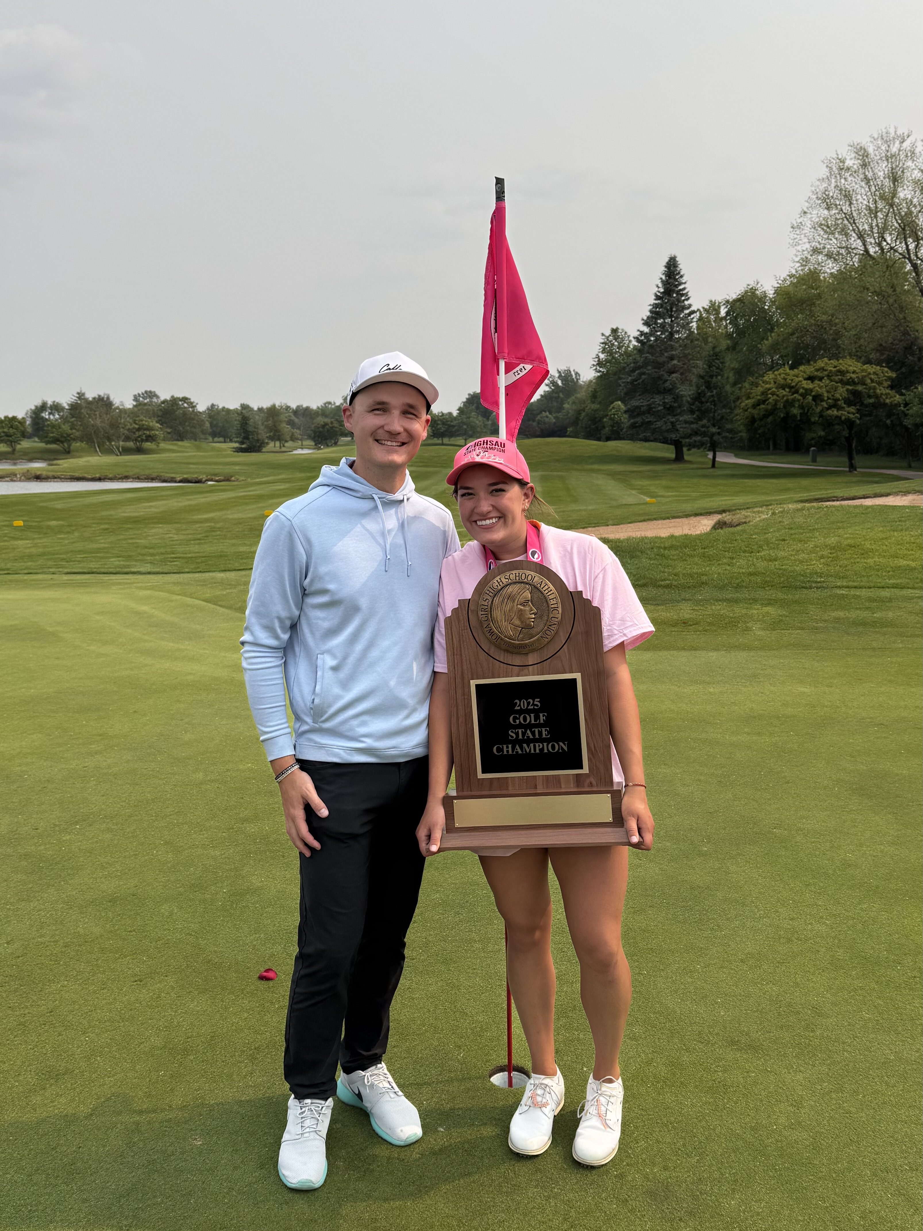 Seth Svejda with Emersen Motl after securing the 2025 Girls 4A Team State Championship